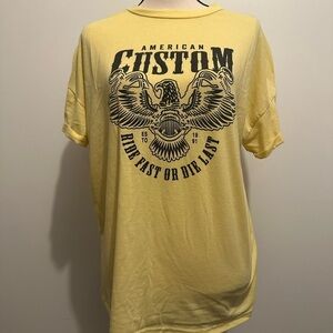 American custom graphic T-shirt, yellow with black print. SZ L EUC cuffed sleeve